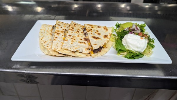image of New (V) Quesadilla