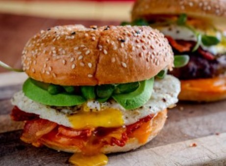image of Bagel with Avocado, Bacon, America Cheese, and Egg