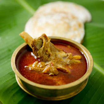 image of Idly With Mutton Curry