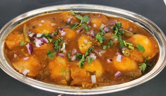 image of 14 Pcs Mini Ghee Idli - Dipped in Sambar