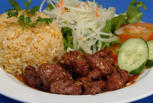 image of R08. Diced Garlic Filet Mignon Steak W/Butter Rice 