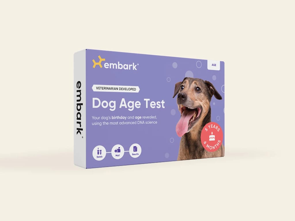 Redirects to the shopping page of Dog Age Test kit. Lila Box of Embark's Dog Age test.