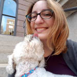 Scientist Casey Ehrlich and her dog Bailey