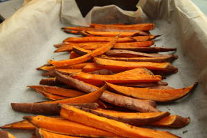 Photo by Louis Hansel on Unsplash of sliced sweet potatoes