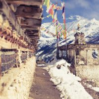 Prayer wheels in high Himalaya Mountains, Nepal village.