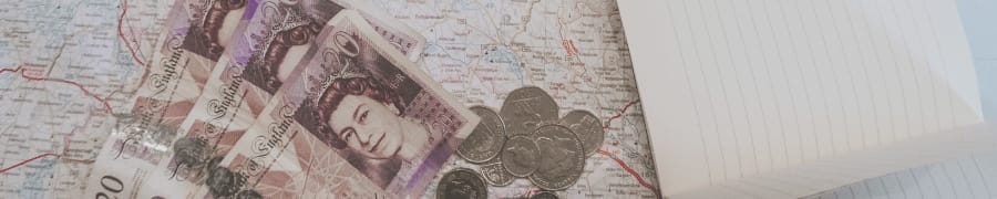 image of money laid on top of a map