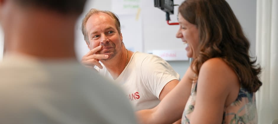 Bild på en UGL deltagare som ler