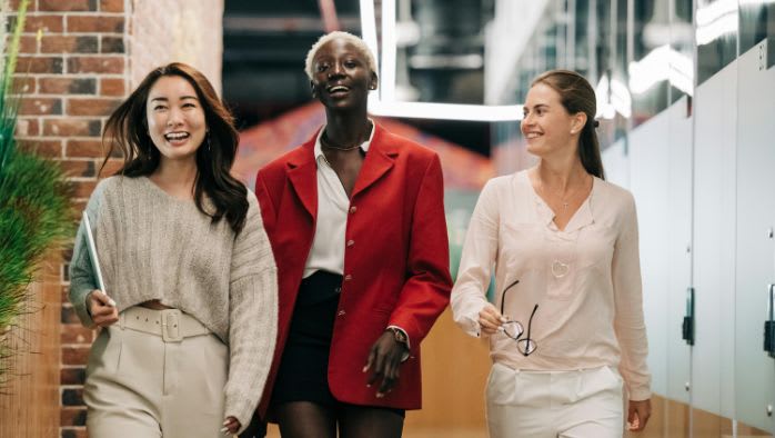3 professional women walking