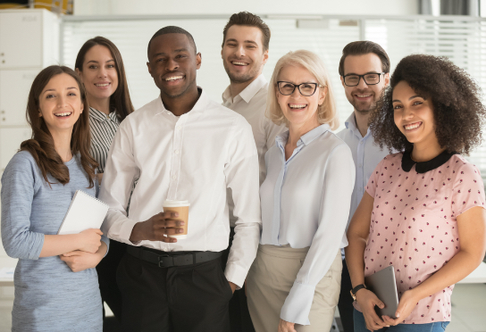 business team smiling for a picture