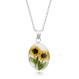 Sterling Silver Medium Oval Pendant Necklace With Containing Two Miniature Sunflowers