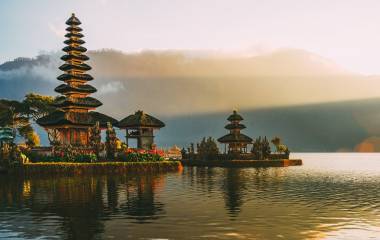 Enchanting Travels Bali Tours Pura Ulun Danu temple panorama at sunrise on a lake Bratan, Bali, Indonesia