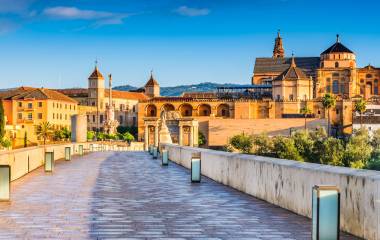 Cordoba, Spain, Andalusia. Roman Bridge connected  Guadalquivir stream  and The Great Mosque (Mezquita Cathedral)