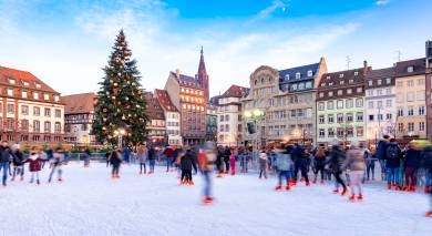 Enchanting Travels France Tours Ice Skating near the Cathedral in Strasbourg
