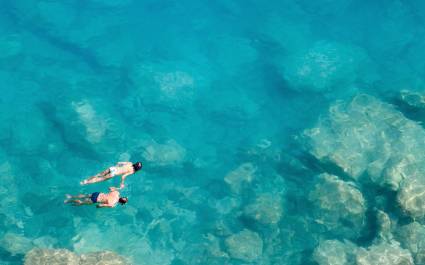 Couple snorkeling, Maldives, Asia - history of Maldives