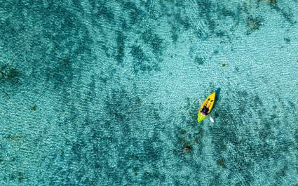 Canoe and kayaks in Polynesia Cook Islands tropical paradise Aitutaki panorama landscape