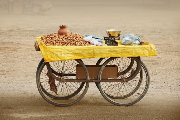 movable-counter-to-sell-roasted-peanuts-india-rajasthan-india-asia-shutterstock_123743368