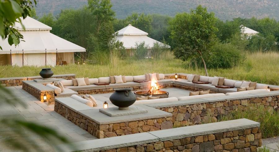 Aman-i-Khas is an exclusive camp set in the wilderness of Rajasthan on the outskirts of the Ranthambore National Park. The camp lies on a gentle slope against a backdrop of brushwood hills.