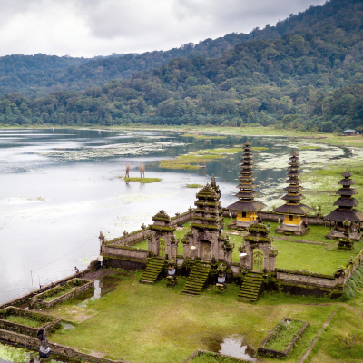 Aerial view of hindu temple ruins of Pura Hulun Danu at the Tamblingan lake, Bali, Indonesia, Asia