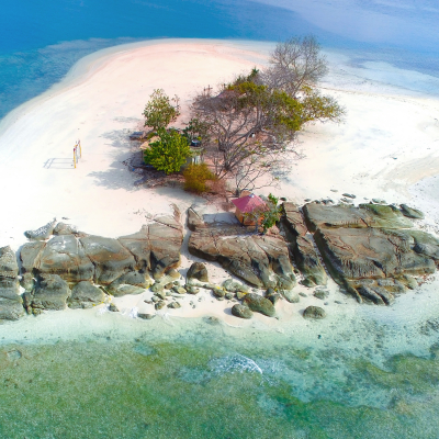 Gili Kedis Lombok, Aerial view of a caribbean desert island in a turquoise water with blue sky background in the morning view, Indonesia, Asia