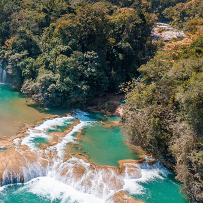is it safe to travel to Mexico? - Aerial view of the majestic turquoise waterfalls at Agua Azul in Chiapas, Mexico, Central America