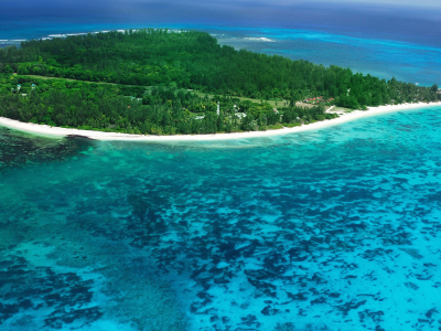 Aerial view of Denis Island Seychelles surrounded by blue sea waters