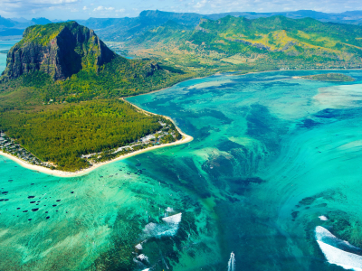 An aerial view of Mauritius, Le Morne Brabant mountain, and the underwater waterfall