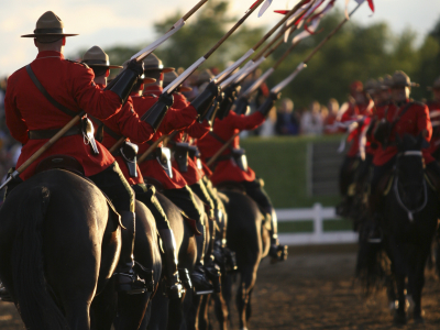 a group of people riding on the back of a horse
