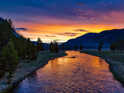 a sunset over a body of water