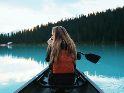 a person standing in front of a body of water