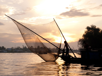 Fishing at dusk on the Mekong River