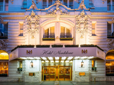 a large brick building with many windows and a fireplace
