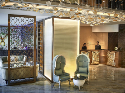 a living room filled with furniture and a large window