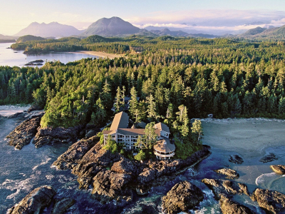 a body of water with a mountain in the background