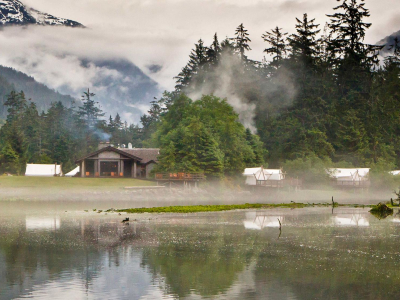 a lake with a mountain in the background