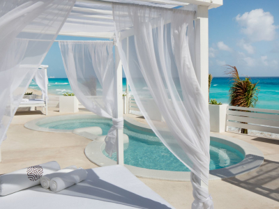 a chair sitting in front of a beach