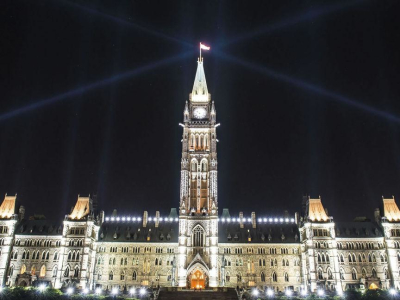 a clock tower lit up at night