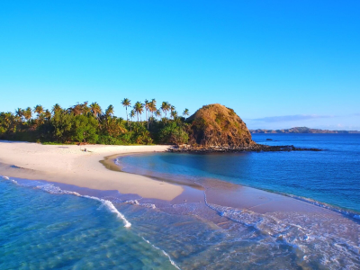 a beach next to a body of water