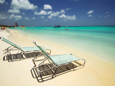 a boat sitting on top of a beach