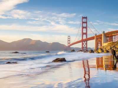 panoramic view of famous Golden Gate Bridge seen from scenic Baker Beach