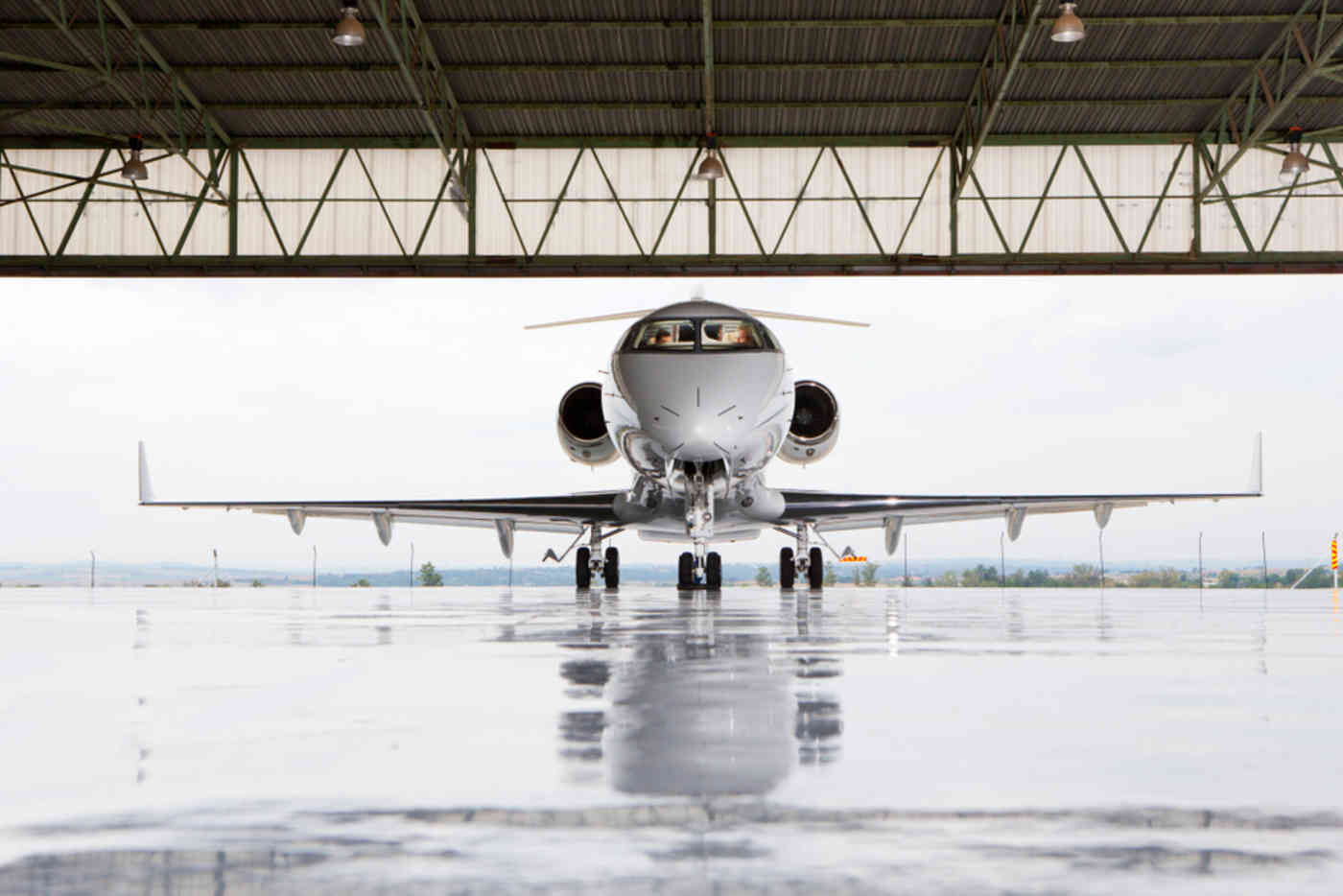 Small private jet on tarmac