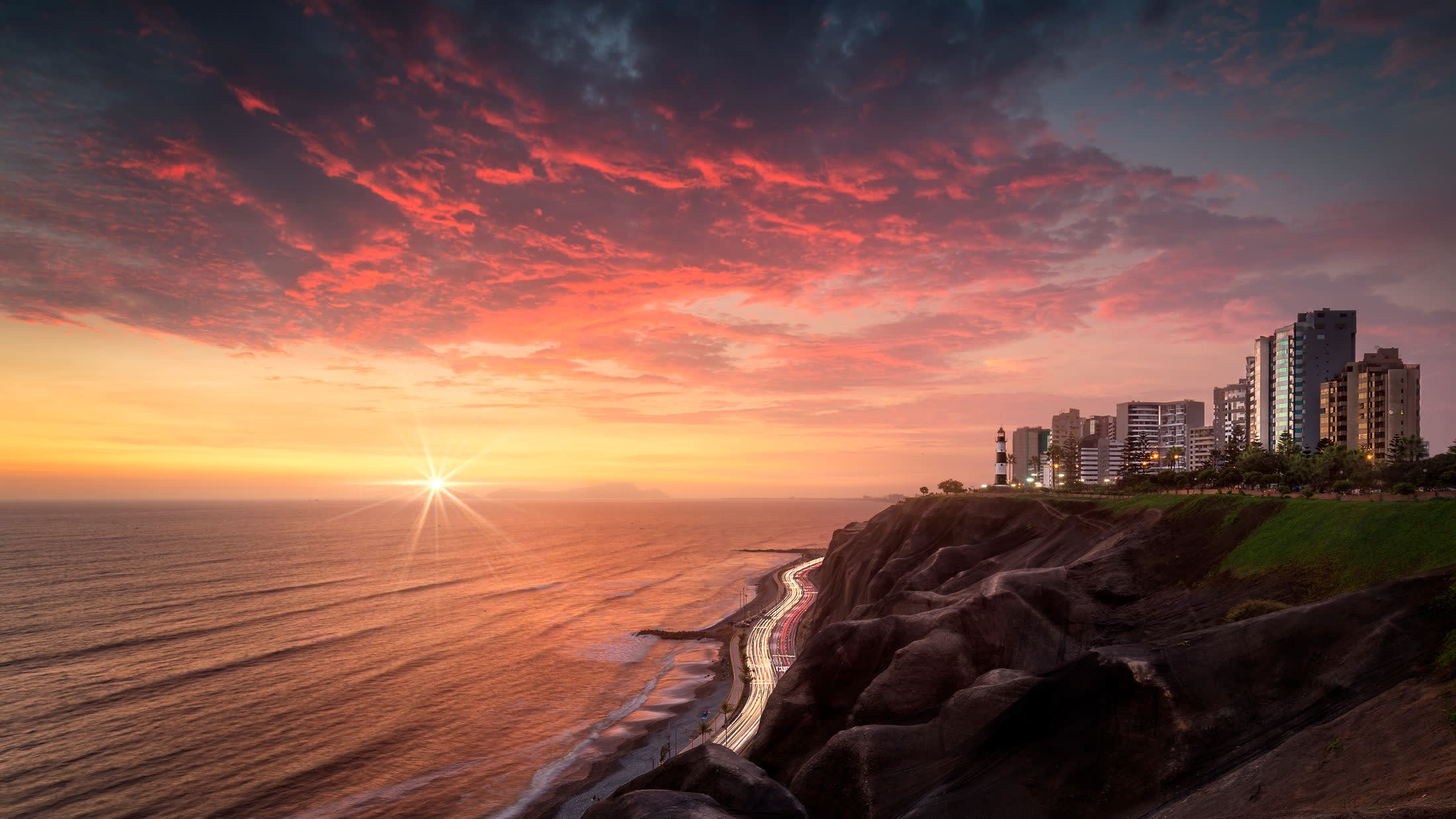 a sunset over a body of water