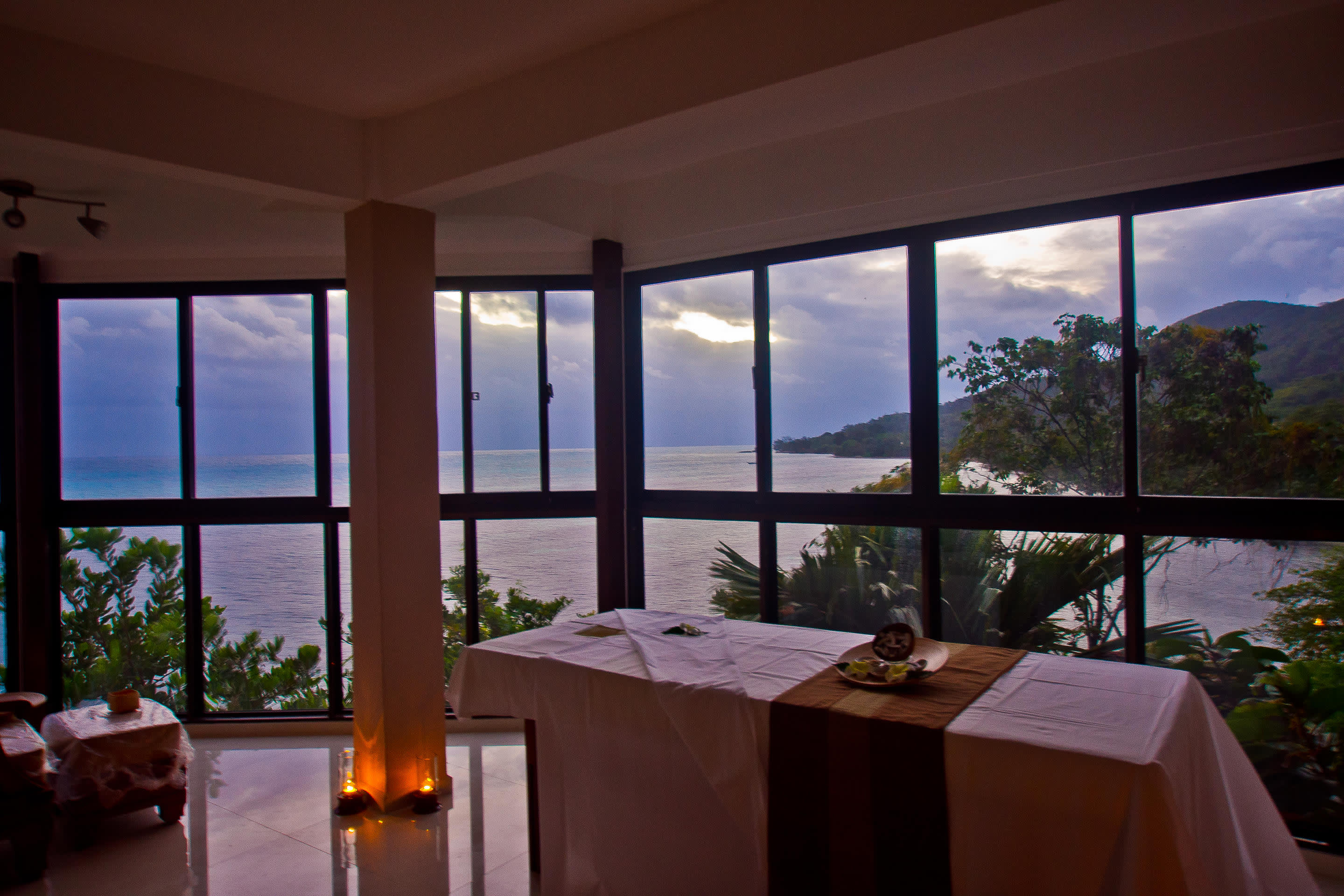 a view of a living room with a large window