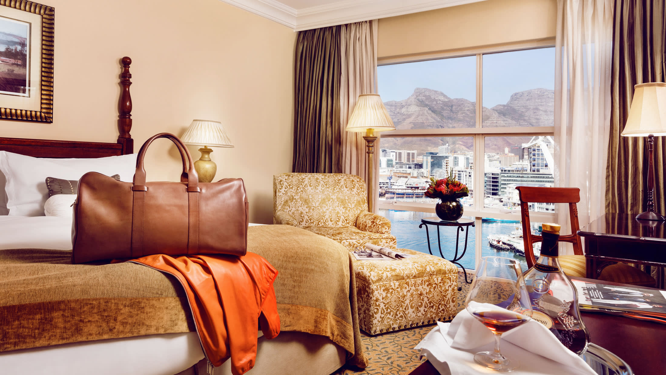 a living room filled with furniture and a large window