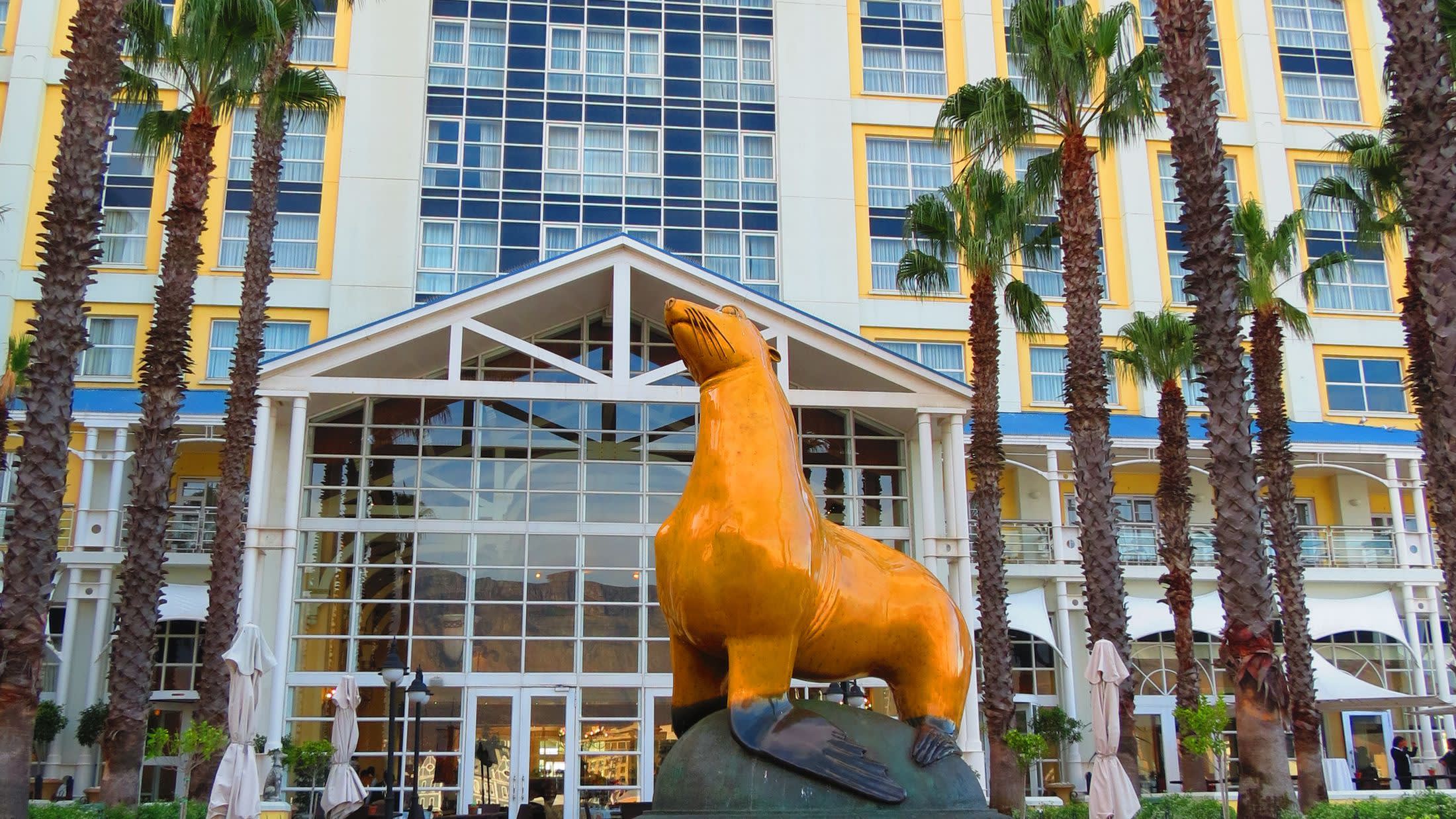 a statue in front of a building