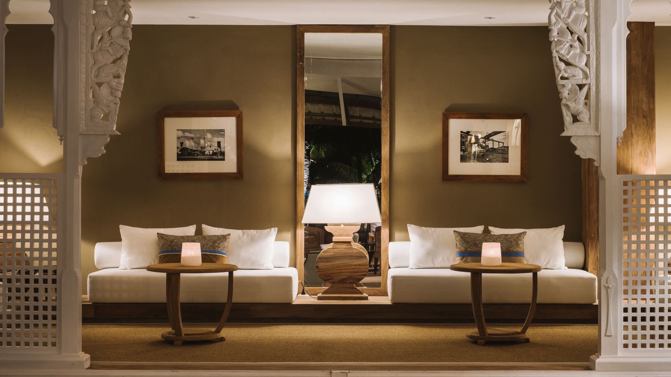 a living room with a large mirror