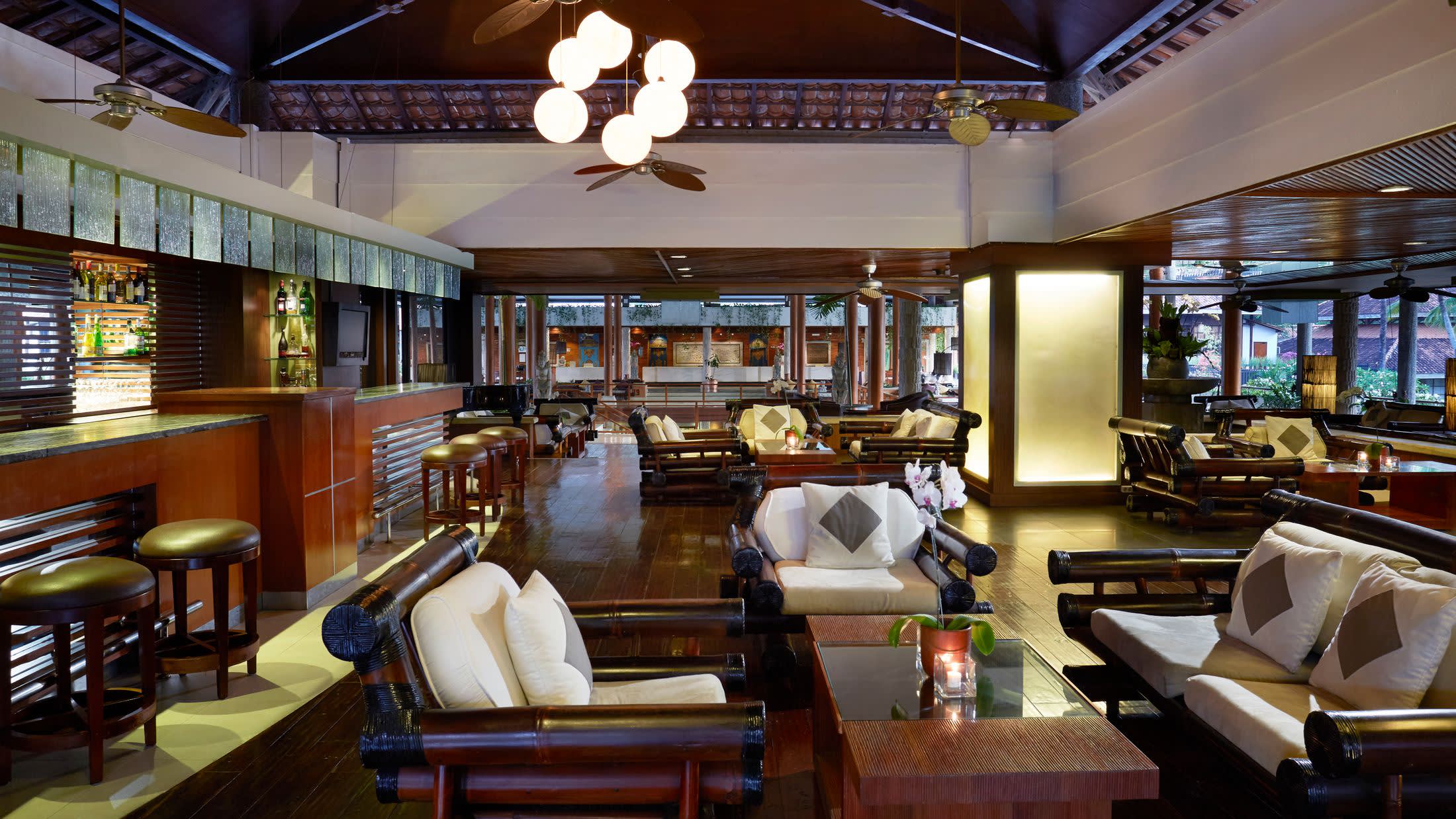 a living room filled with furniture and a fire place