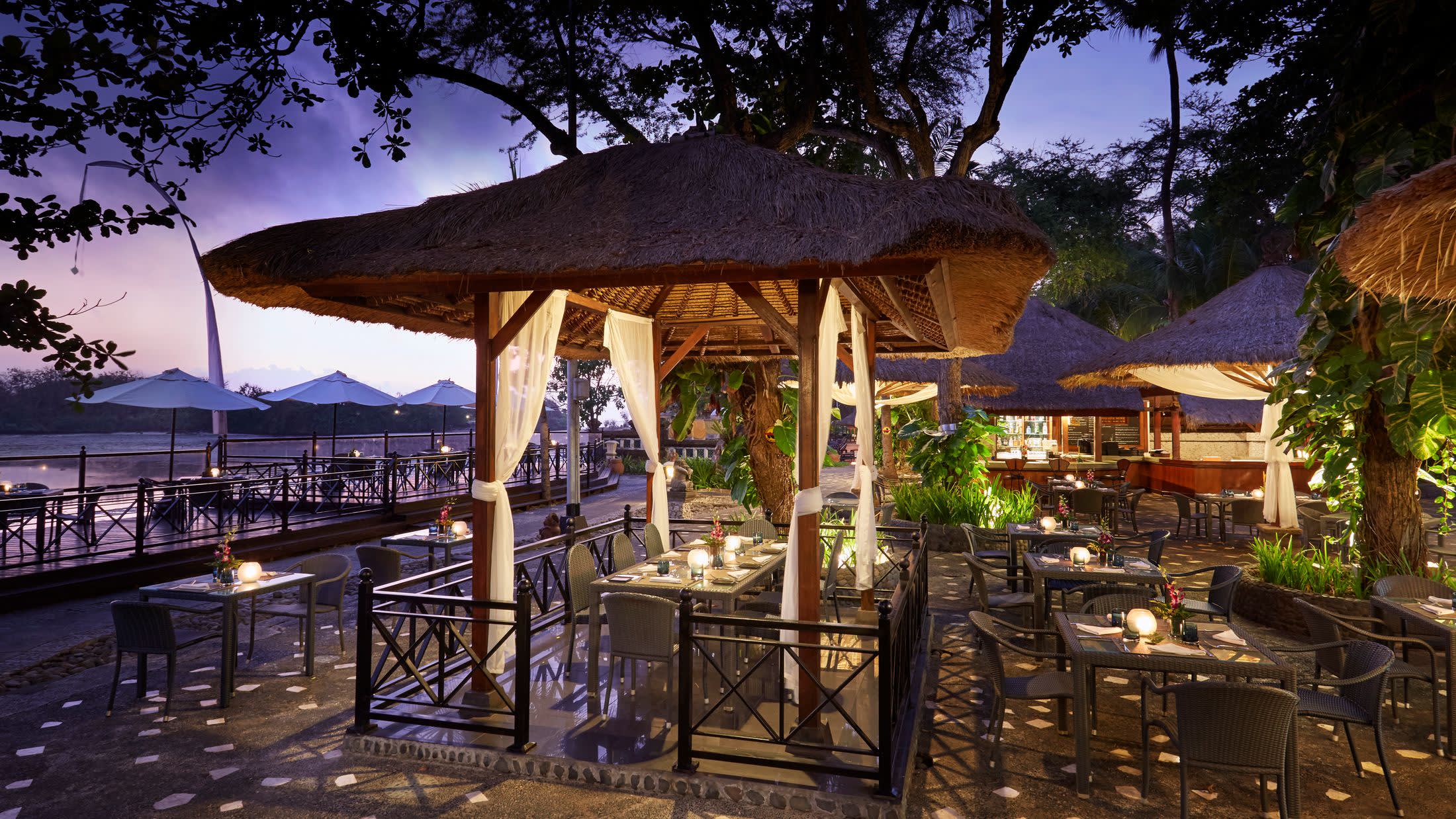 a dining room table in front of a building