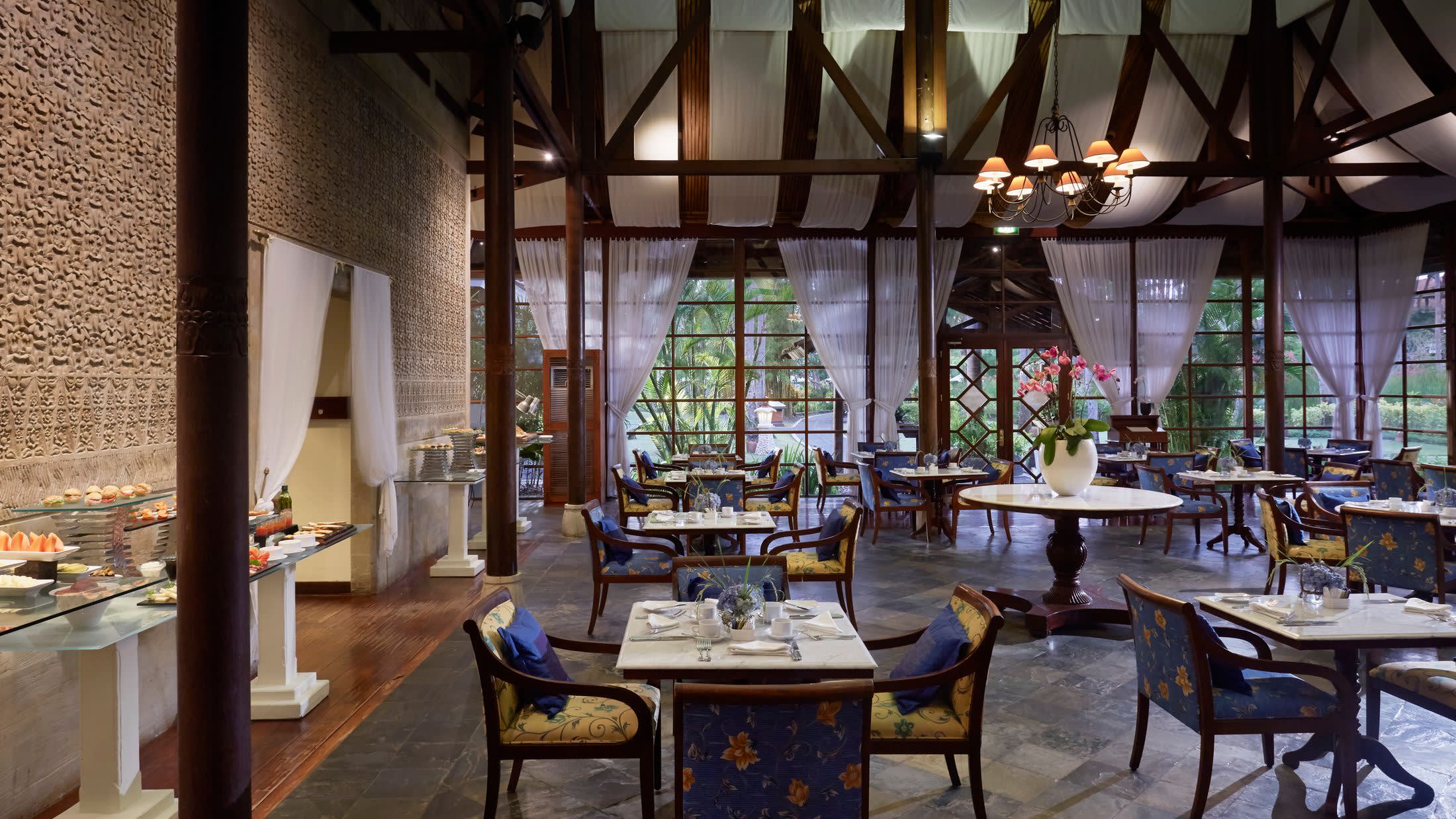 a dining room table in front of a building