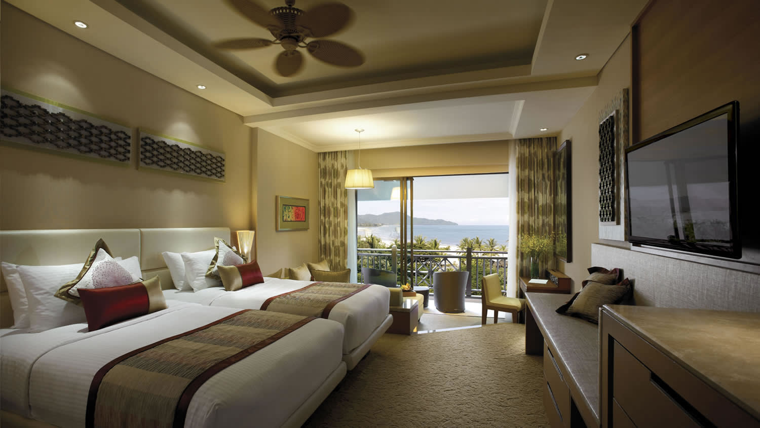 a bedroom with a large bed in a hotel room