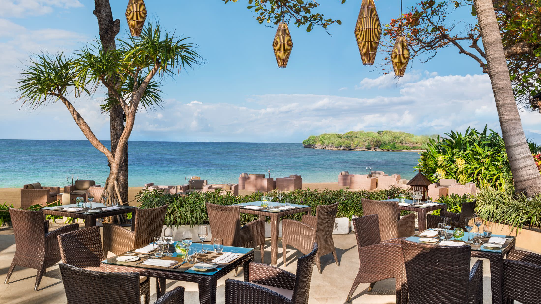 a chair sitting in front of a body of water